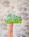 Defying Gravity Sticker