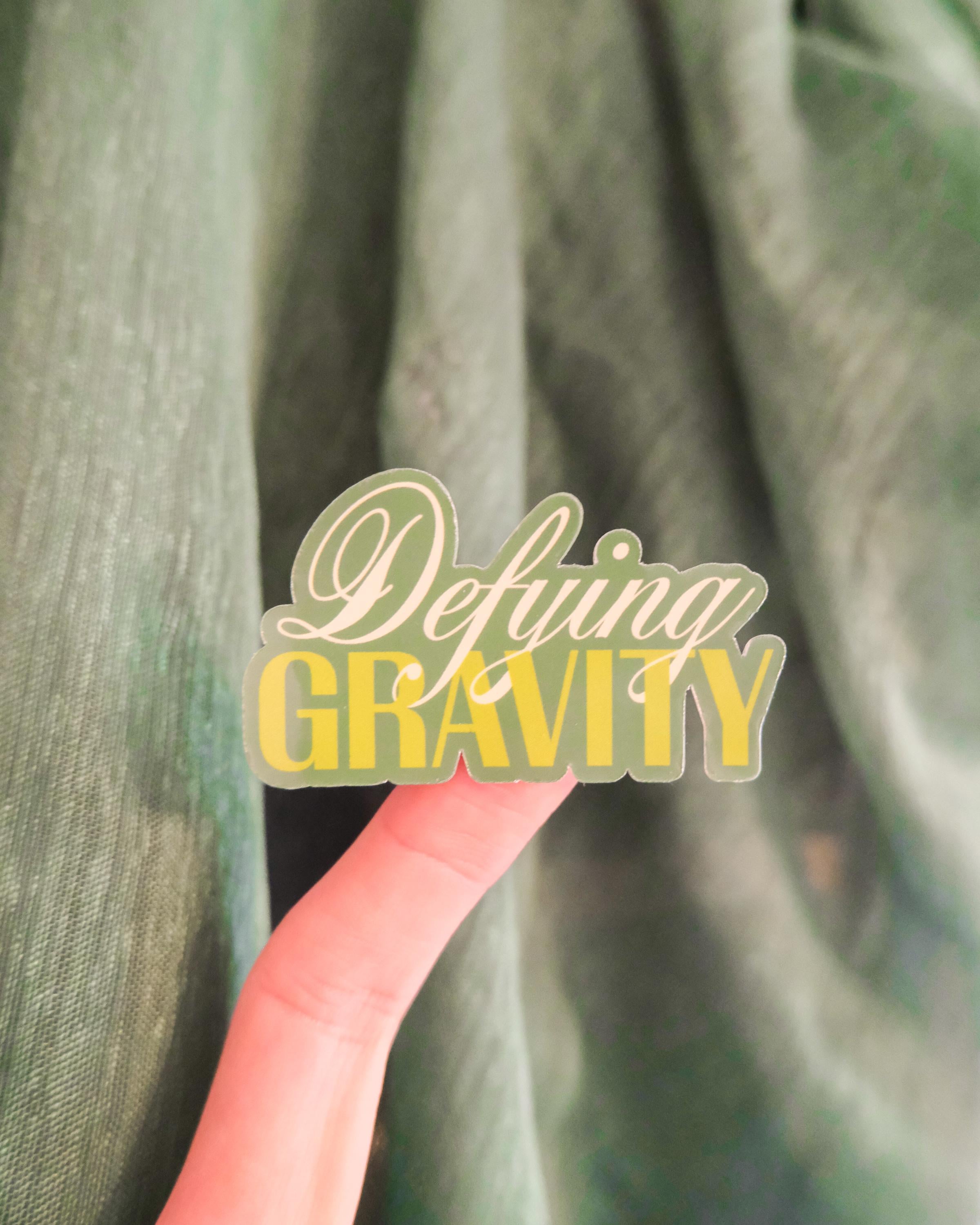Defying Gravity Sticker